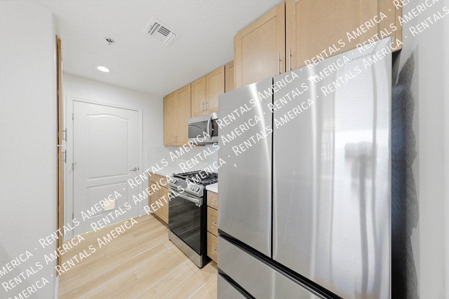 Upgraded 4th Floor Condo at Tapestry on Central 2 Bed + Studio property image