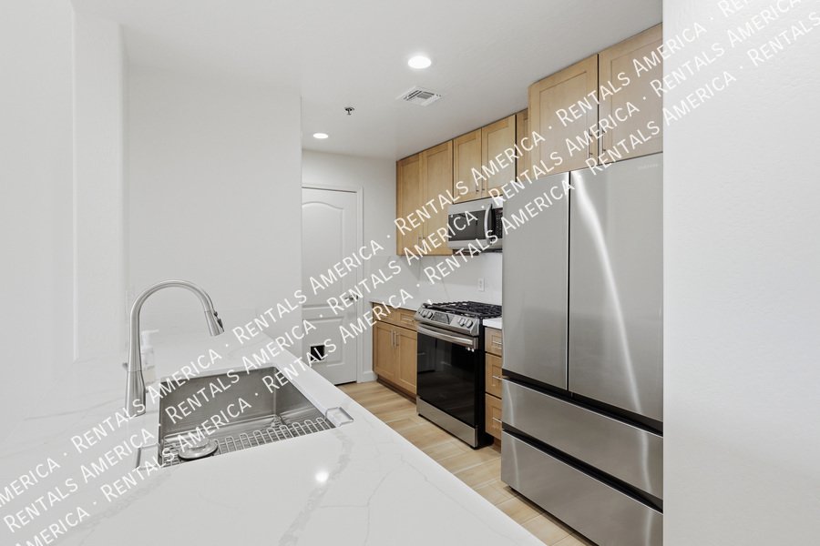 Upgraded 4th Floor Condo at Tapestry on Central 2 Bed + Studio property image