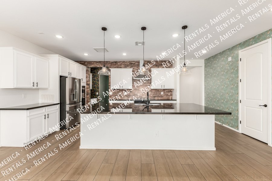 Stunning 5BR/4BA Home with Room for Everyone in Surprise property image