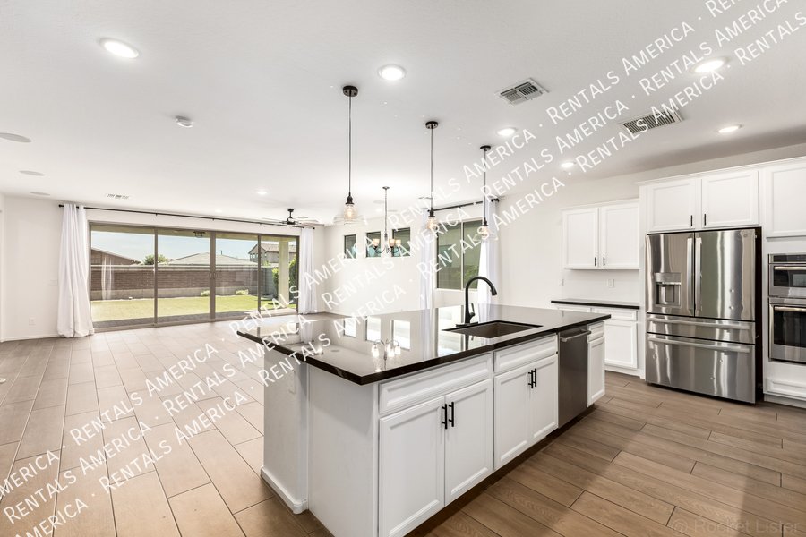 Stunning 5BR/4BA Home with Room for Everyone in Surprise property image