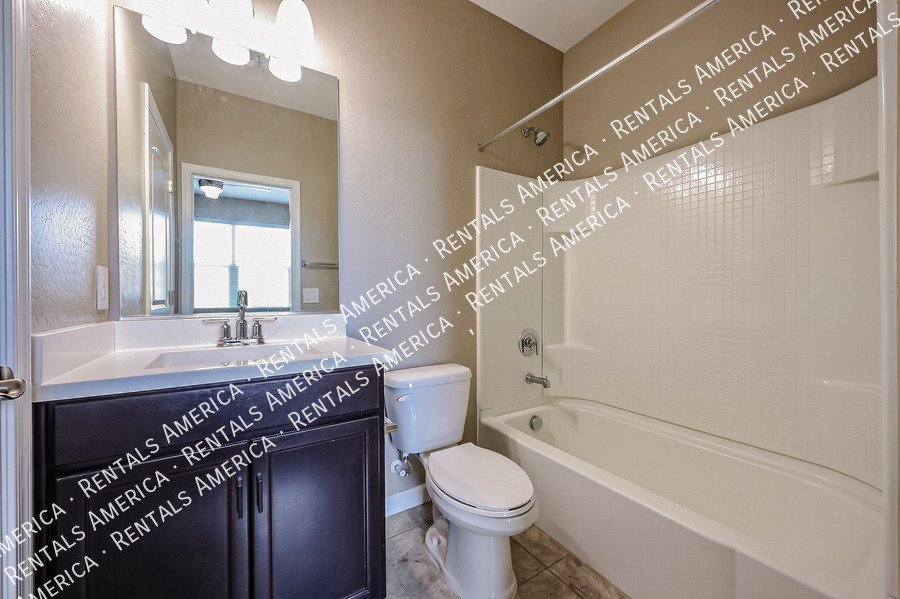 Spacious 4-Bedroom Home with Two Primary Suites in Tartesso! property image