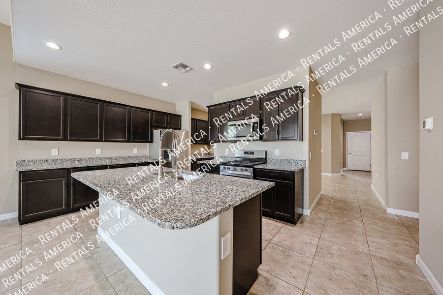 Spacious 4-Bedroom Home with Two Primary Suites in Tartesso! property image