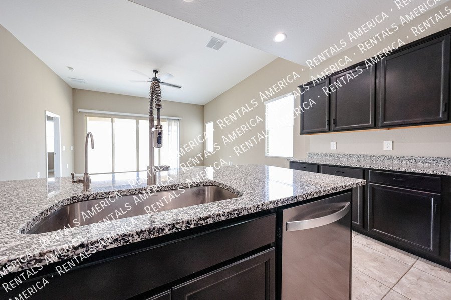 Spacious 4-Bedroom Home with Two Primary Suites in Tartesso! property image
