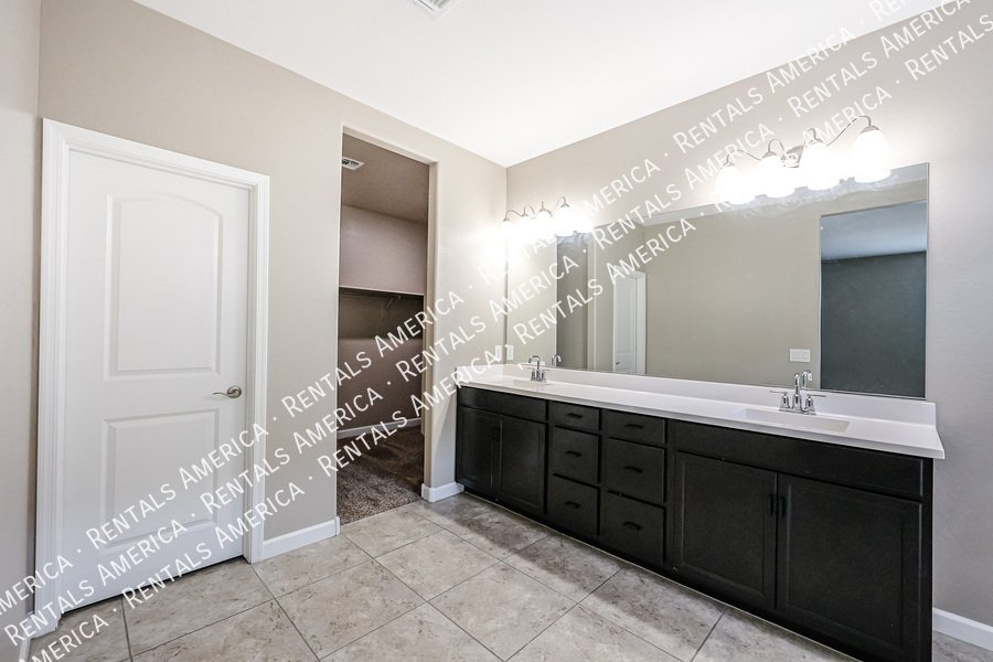 Spacious 4-Bedroom Home with Two Primary Suites in Tartesso! property image