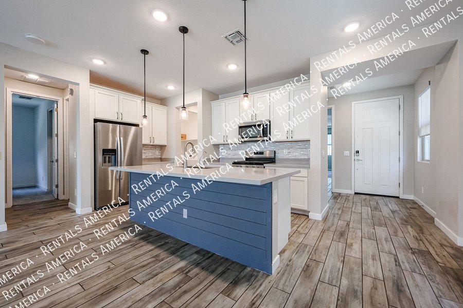 Upgraded 4 Bedroom Home with Private Guest Suite in Harvest property image