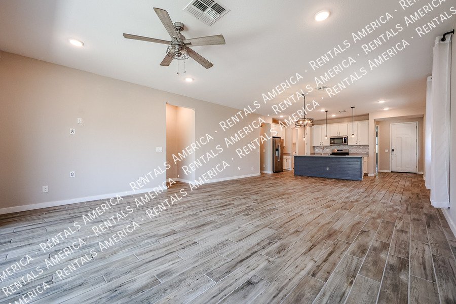 Upgraded 4 Bedroom Home with Private Guest Suite in Harvest property image