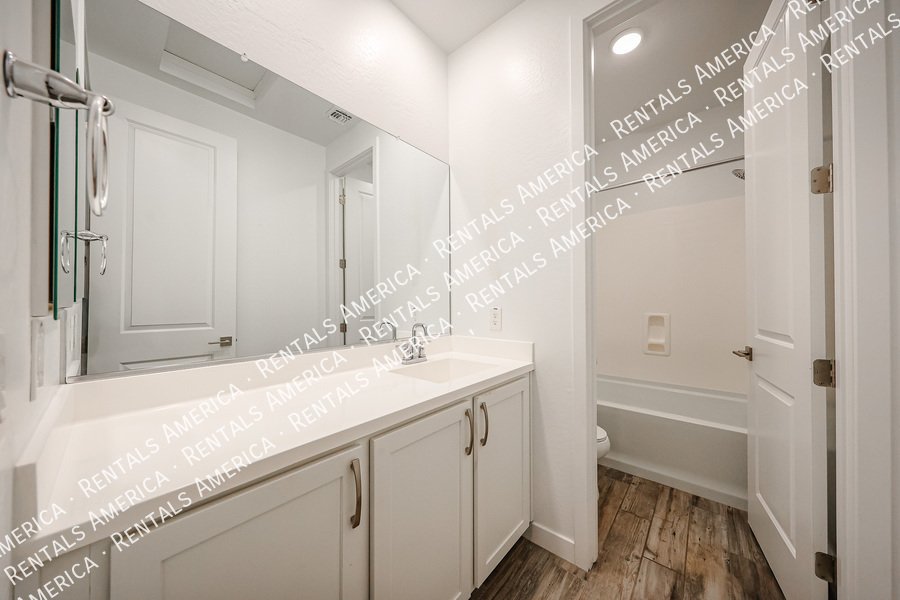 Upgraded 4 Bedroom Home with Private Guest Suite in Harvest property image